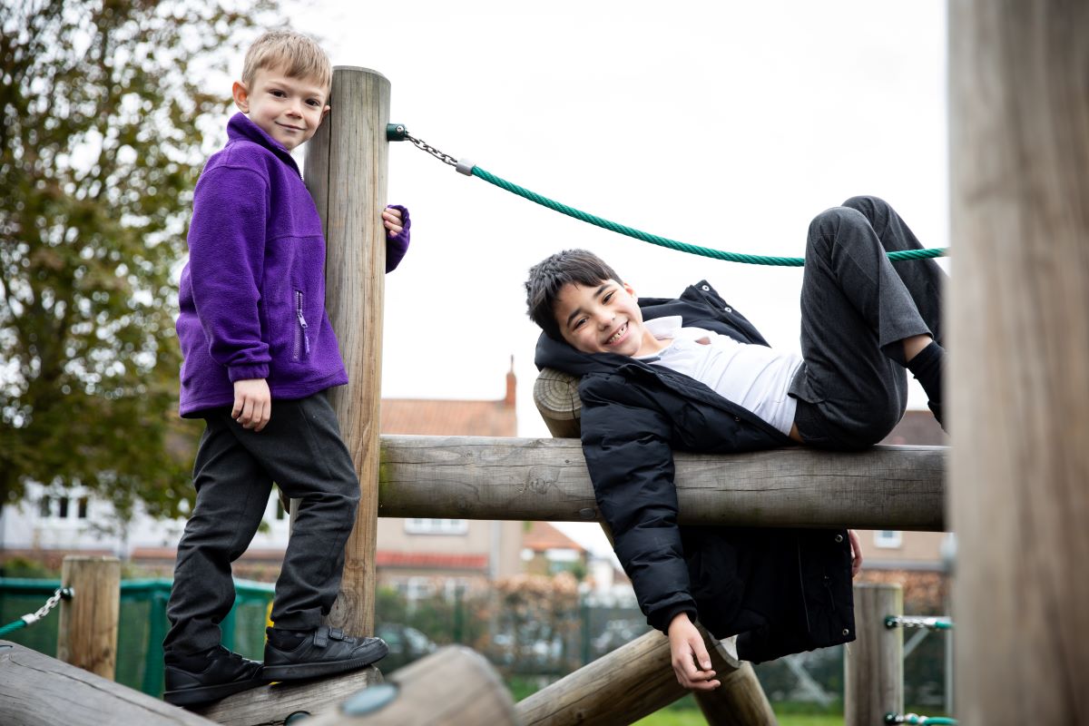 2 boys climbing