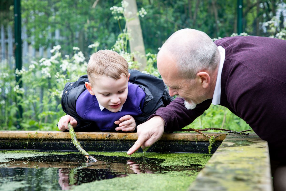 Boy and pond